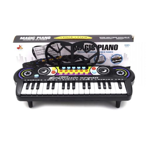 Уцінка. Піаніно з підставкою для нот "Magic Piano", 34 клавіші - не працюють три клавіші